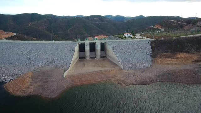 Aerial. Portuguese hydroelectro dam Odelouca, in mountains of Monchique. Algarve Portugal