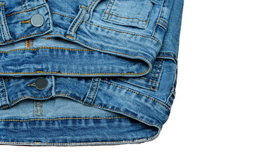 jeans on the background, blue jeans lie on a wooden background,