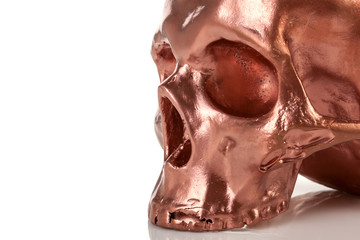 Human metal skull isolated on white.