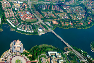 Overhead city view - Prime Minister's Department Complex, Federal Government Administrative Centre - Jabatan Perdana Menteri,  Putra Mosque with Putra lake. Aerial cityscape of Malaysia..