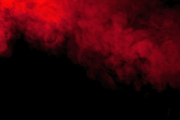 red smoke or steam on a black background for wallpapers and backgrounds