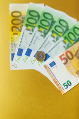 Background with american dollar and euro bills.