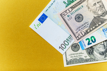 Background with american dollar and euro bills.