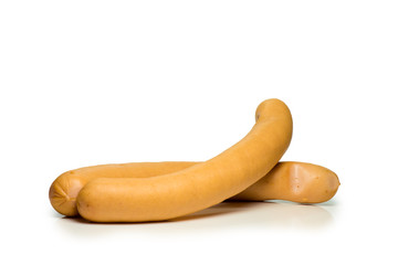 Two sausages set against white background