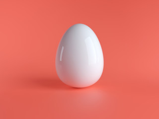 White egg isolated on living coral 16-1546 background