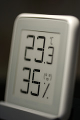 Room thermometer-hygrometer on e-ink.