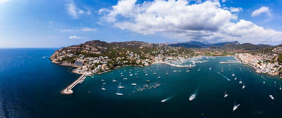 Spain, Balearic Islands, Mallorca, Andratx Region, Aerial view of Port d'Andratx, coast and natural harbor with lighthouse
