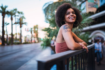 USA, Nevada, Las Vegas, portrait of happy young woman in the city