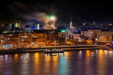 Foto op Plexiglas Novi Sad, Serbia - January 01, 2019: Fireworks in Novi Sad, Serbia. New Year's fireworks. © nedomacki