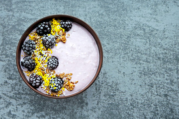 Healthy breakfast bowl with yogurt and berries. Breakfast with fermented dairy products.