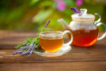 delicious green tea in beautiful glass bowl on table