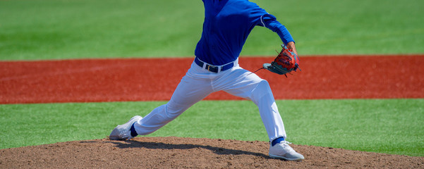 Pitcher and third baseman during a baseball game