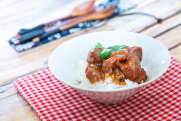 Asian style caramel pork with rice and vegetable