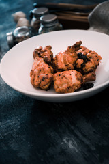 fried chicken wings on table