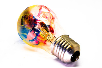 lightbulb in paint of different colors