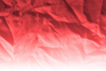 Elegant red textile background. Silk cloth texture. Fabric pattern.