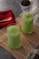 Green milk tea bubble on gray background