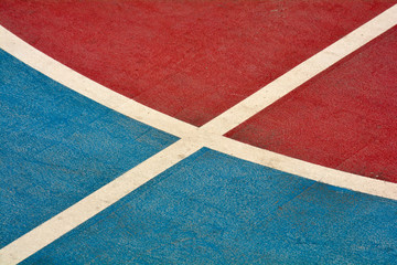 Fototapeta na wymiar closeup blue and red basketball court