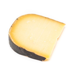 Dutch Extra Mature Gouda Cheese isolated on a white studio background