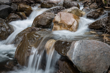 Naklejka na ściany i meble Rocks in a stream
