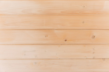 wood wall background.wooden texture.natural pattern.light brown color.horizontal boards.