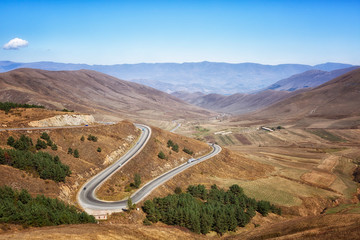 car driving on mountain serpentine, Armenia