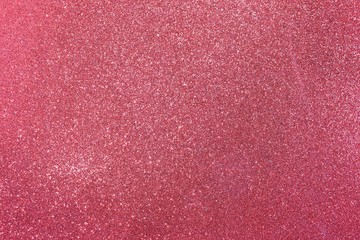 Fototapeta premium red background with plenty of glittering luminous glitterati gli