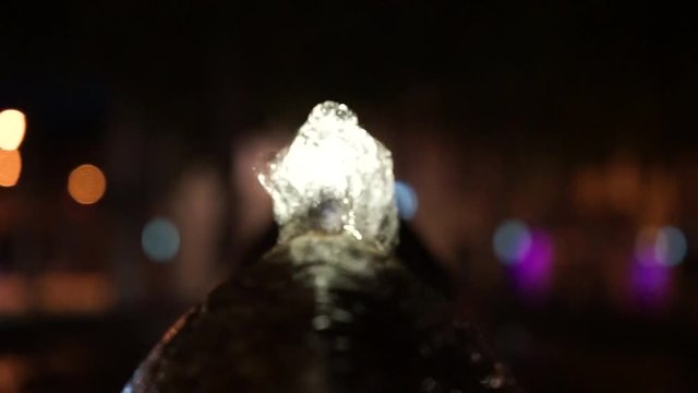 water sparkling from fountain at night video