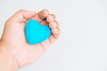man holding hands  heart on white background