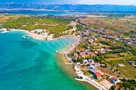 Aerial view of Zaton tourist waterfront and Velebit mountain background