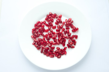 pomegranate grains on a plate