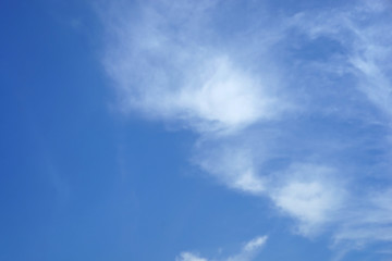 Blue skies and white clouds background. 