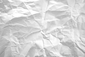 Crumpled white paper as background