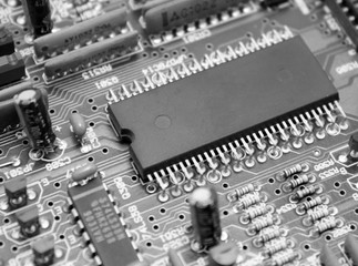 Electronic circuit board with microchip and transistors