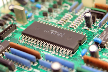 Electronic circuit board with microchip and transistors