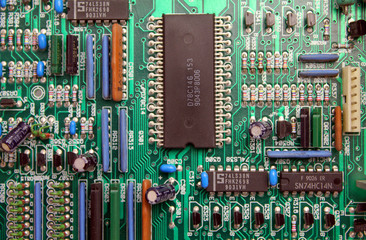 Electronic circuit board with microchip and transistors