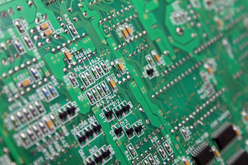 Electronic circuit board with microchip and transistors