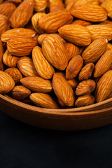 Almonds Nuts in the Bowl Background. Selective focus.