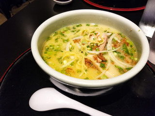 Traditional ramen curry soup with vegetables.