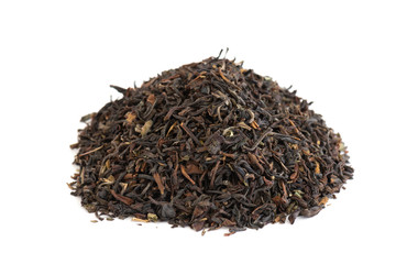 Fototapeta premium Stacked dried tea leaves isolated on white background