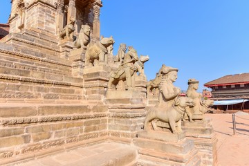 Fototapeta premium Ancient Stone Guardian Statues of Siddhi Lakshmi Temple in Bhaktapur Durbur Square