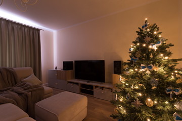 Interior. living room, Christmas tree, yellow light