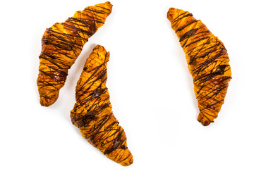 Chocolate Croissants Isolated on White Background. Selective focus.