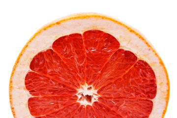 half grapefruit on white background close-up