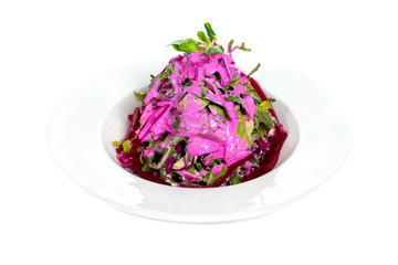 Fresh salad of beetroot and rocket salad isolated on white