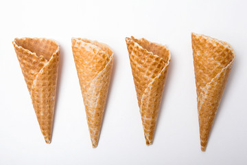 Waffle ice cream cones on a white background.