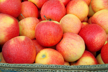 Red apples in the paper box. Apples harvest
