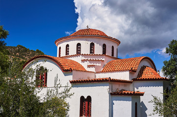 Orthodox church with dome in greek town, Crete..