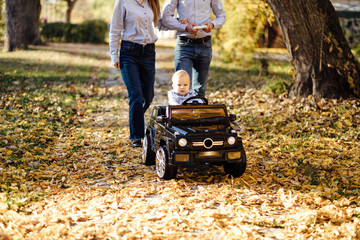 The concept of a happy family. Happy family in the park.