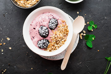 Homemade Vegan Banana, Spinach, Spirulina Nice Cream or Sorbet. Black background, summer food concept.